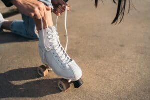 Close-up,Of,Woman,Lacing,Up,Quad,Roller,Skate.,Close-up,View